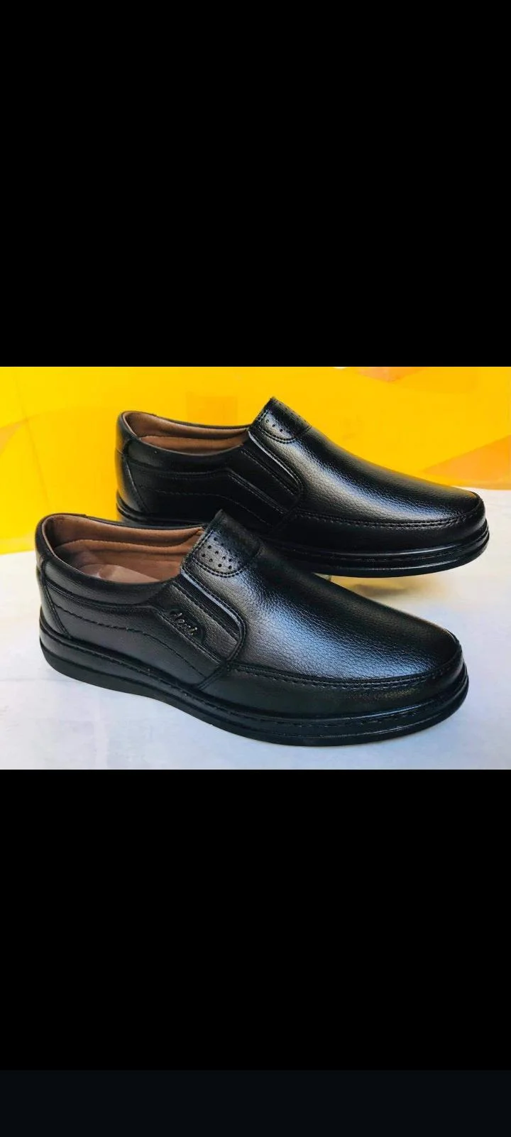 تولیدی کفش حسین‌زاده