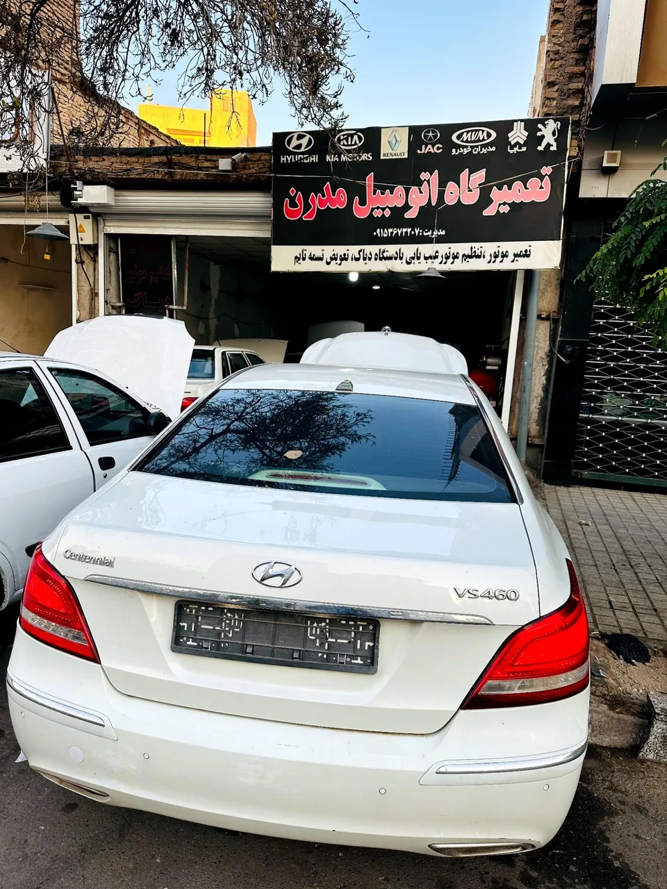 تعمیرگاه و فروشگاه لوازم یدکی اتومبیل مدرن - تصویر 5