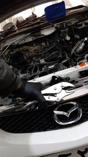 تعمیرگاه و خدمات خودرویی اسدی