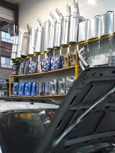 تعویض روغن و اگزوز علی رنجبر