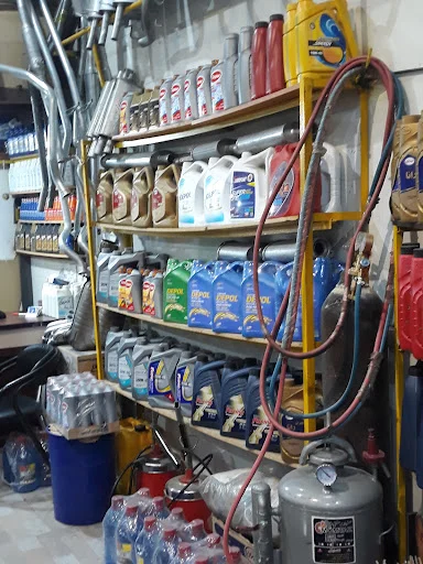 تعویض روغن و اگزوز علی رنجبر