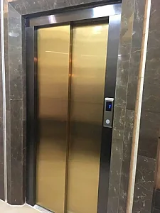 آسانسور وپله برقی عزیزی