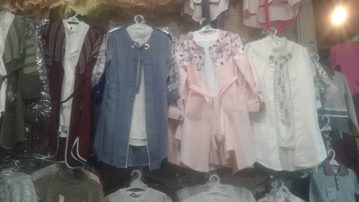 تولید و پخش پوشاک بچه گانه شیری