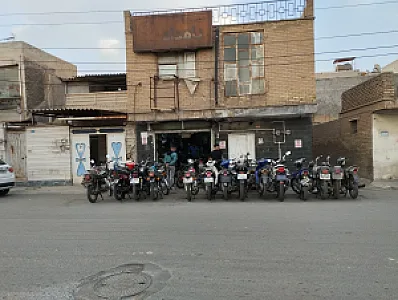 تعمیرگاه موتورسیکلت اُس رضا جولا