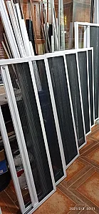 تولید درب و پنجرهٔ دوجداره UPVC و توری پلیسه در دردشت