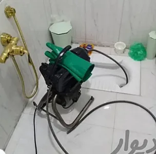 لوله‌بازکنی و تخلیه چاه در سازمان برنامه