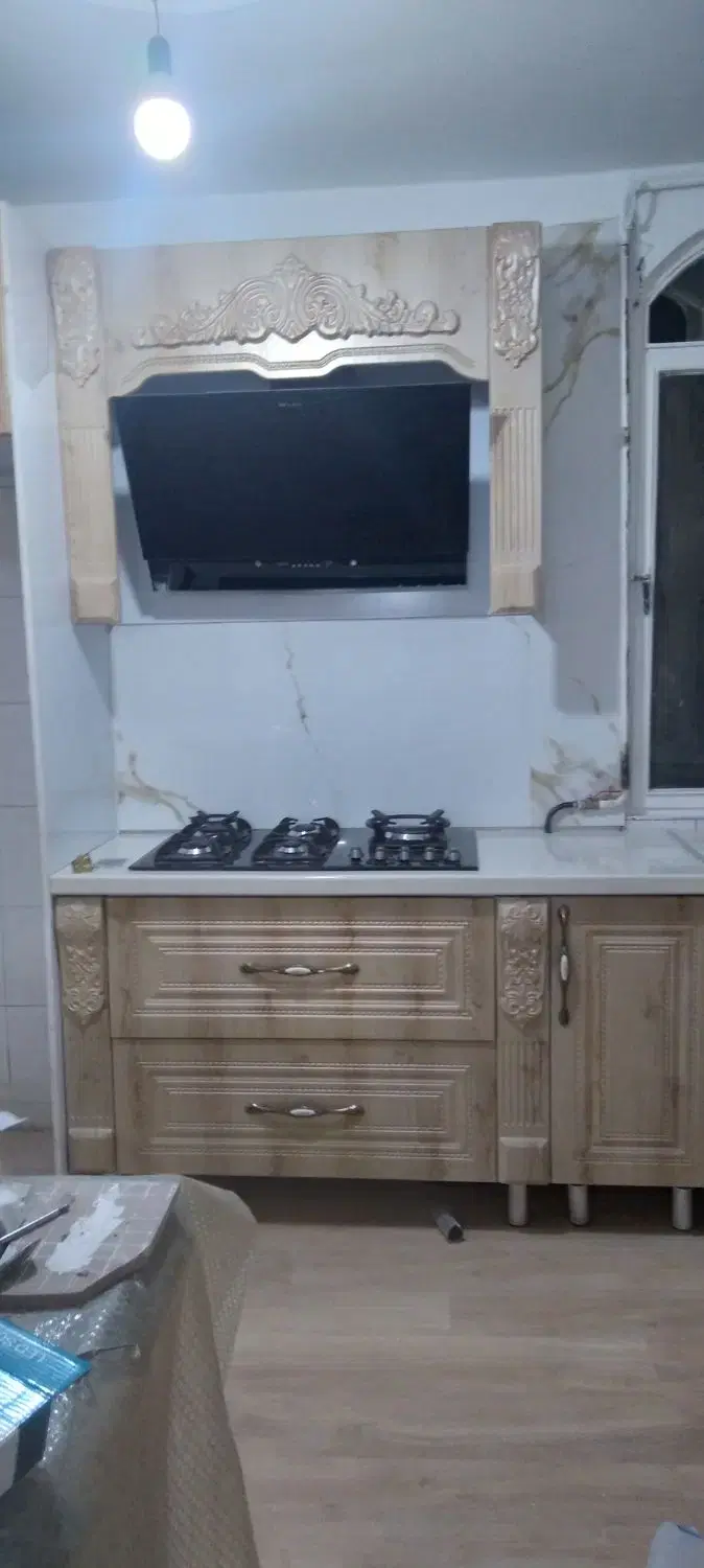 کاشی‌کاری و بازسازی ساختمان در مجیدیه