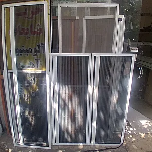درب و پنجره دوجداره و توری پلیسه در شارق