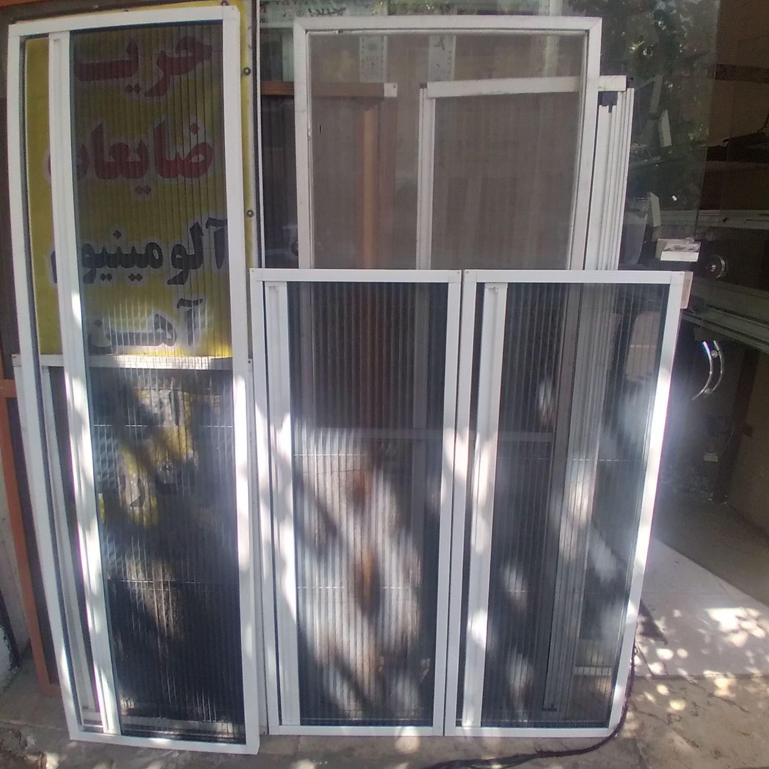 درب و پنجره دوجداره و توری پلیسه در شارق