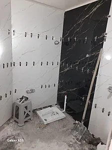 کاشی‌کاری و بازسازی در جنت‌آباد شمالی