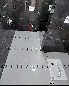 کاشی‌کار و بازساز در ستارخان
