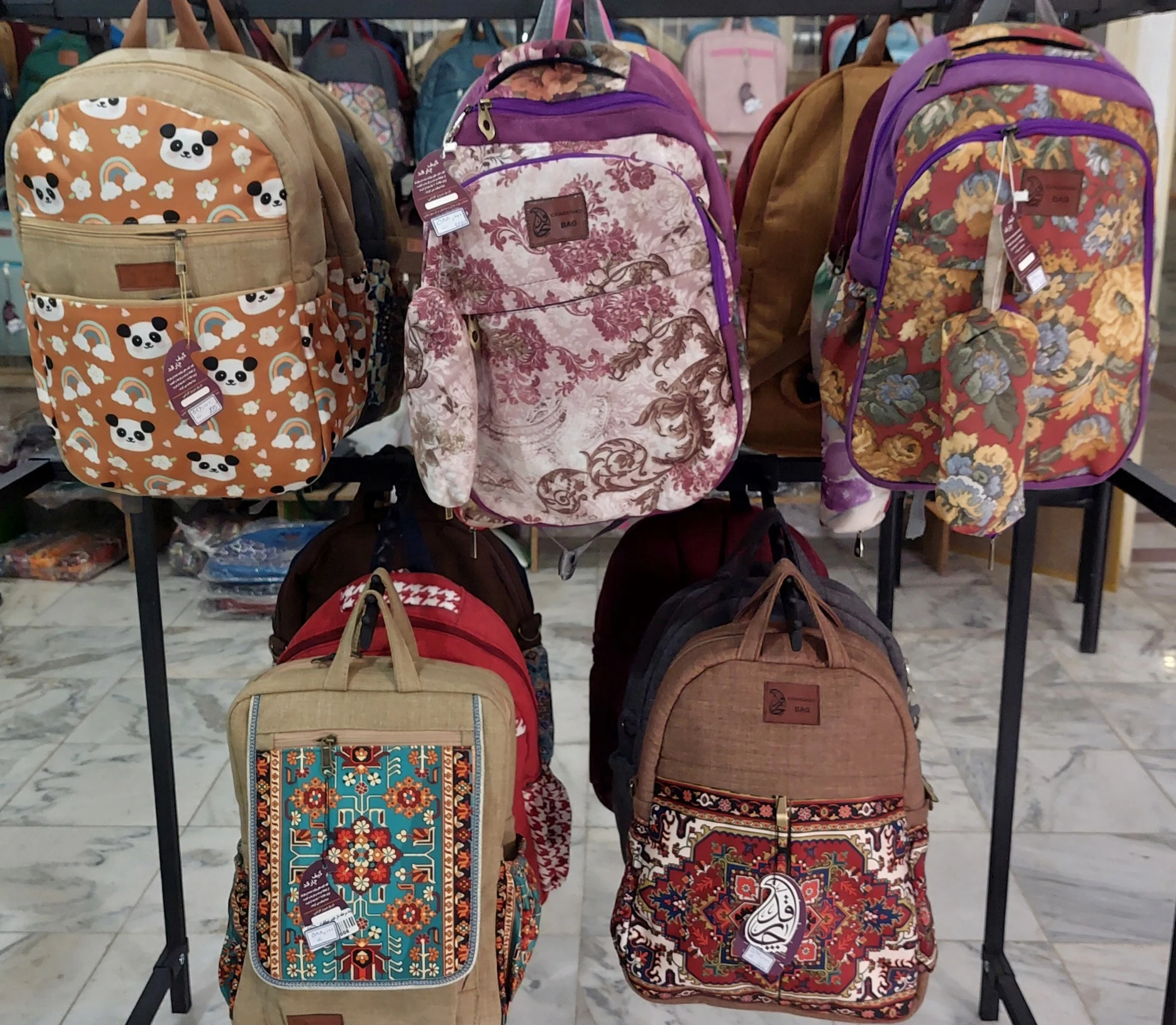 فروشگاه تخصصی کیف و کوله پشتی تالی موعود